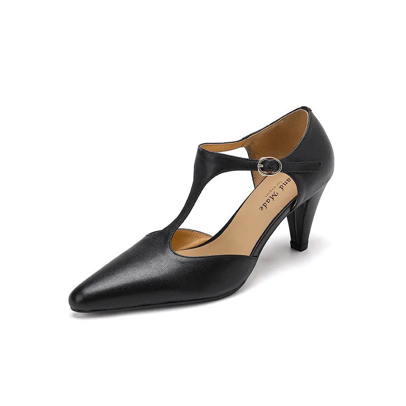 Brown women's retro sandals with a T-strap buckle and a short stout heel.