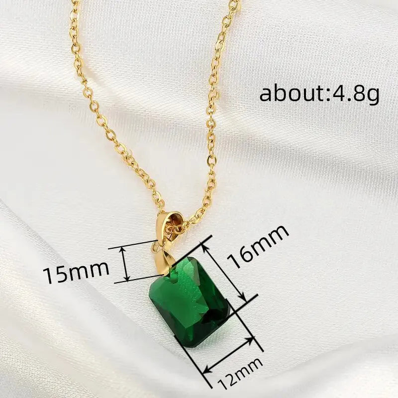 Rectangular copper pendant necklace with geometric quadrilateral design and green finish on O-ring chain.