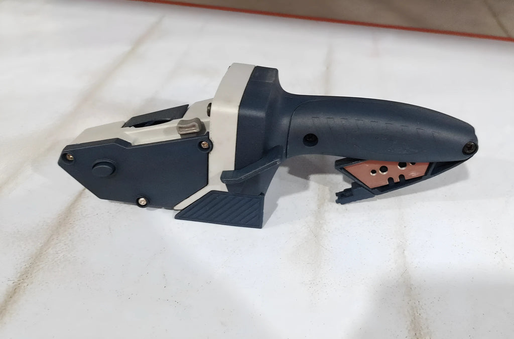 Blue multifunctional woodworking cutter with aluminium alloy frame and TPR handle for dust-free board cutting.