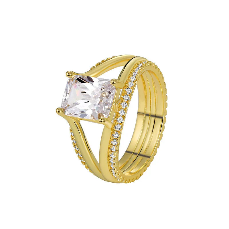 Geometric gold electroplated ring with square zircon stone showing European styling