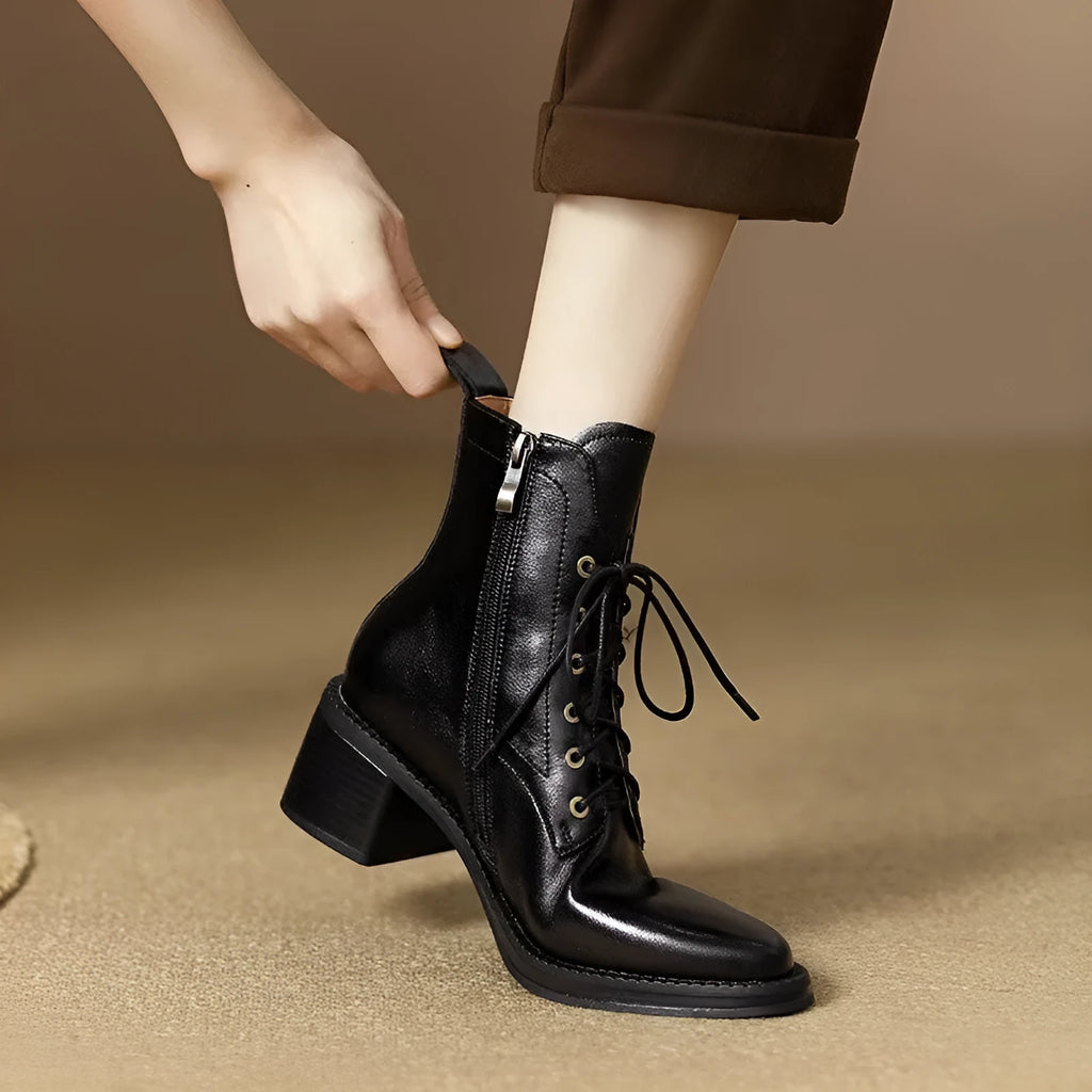 Women's black pointed-toe ankle boots with 5.5cm heel and artificial PU upper material