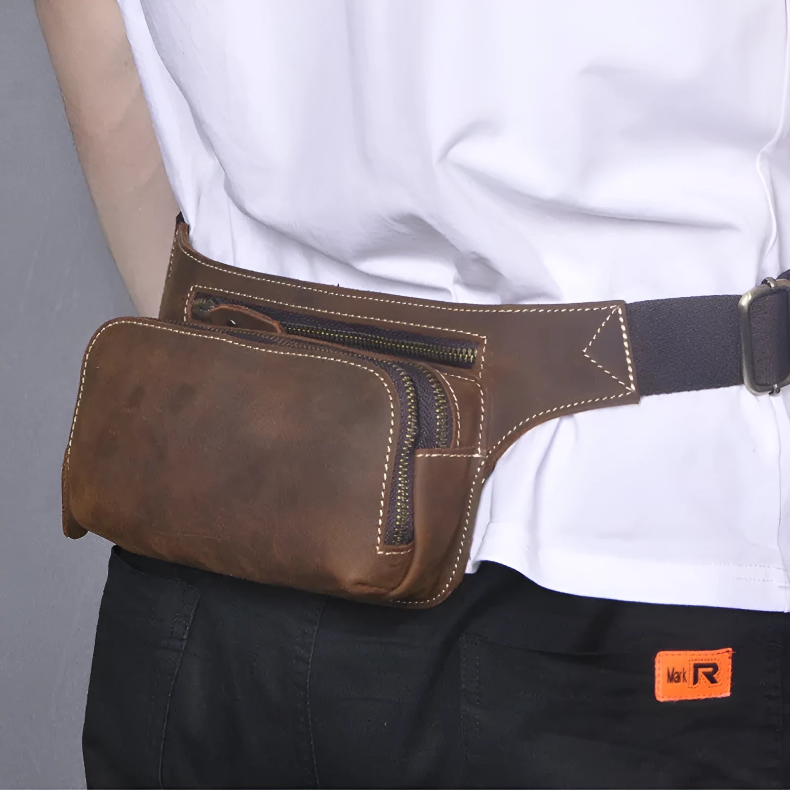 Brown genuine cowhide men's sports waist bag with pull closure and internal organisation compartments