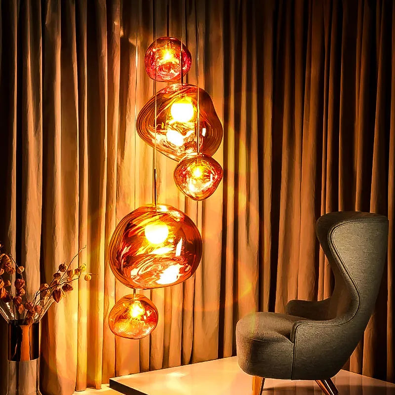 Nordic style irregular glass lava lamp chandelier in gold, silver, or red copper, available in three different sizes.