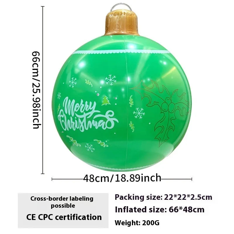 Large inflatable Christmas ball decoration with LED lights in garden setting