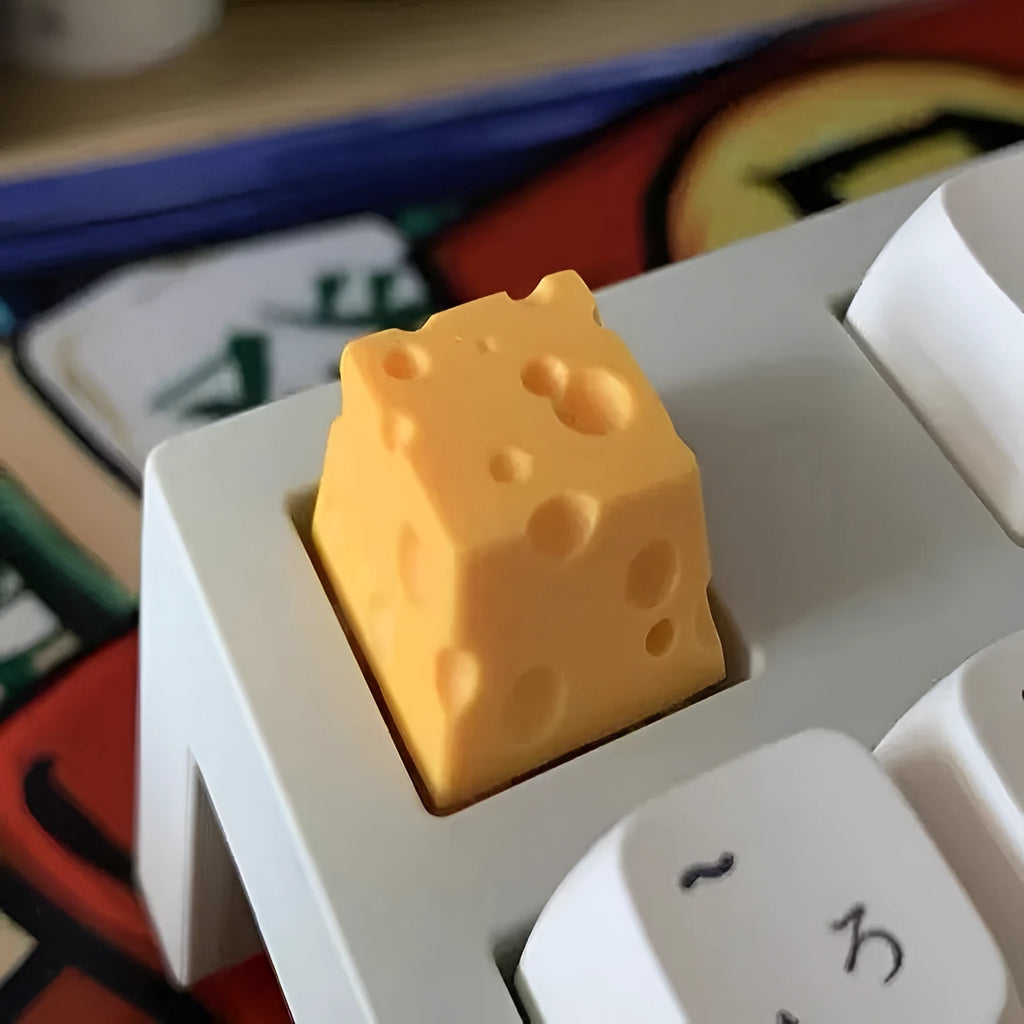 Yellow resin cheese character keycap for mechanical keyboards with Cherry MX compatibility