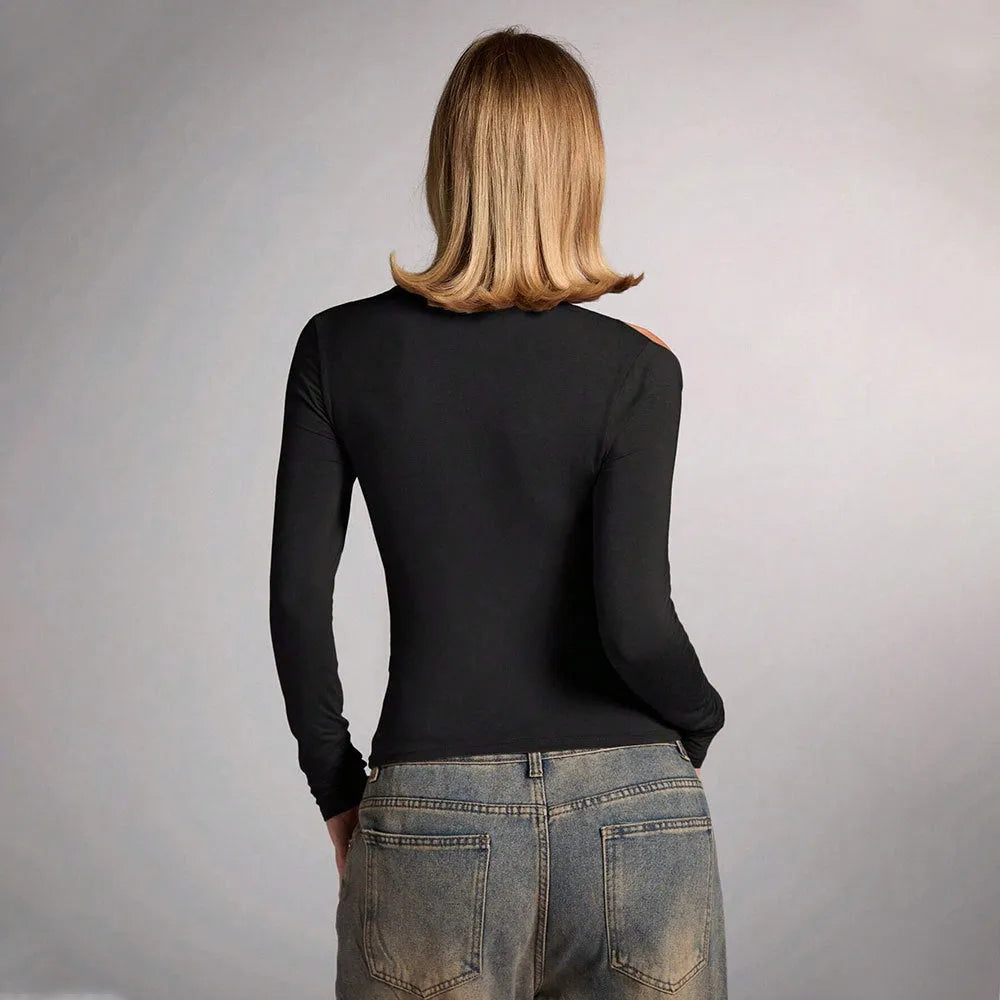 Black women's halter neck long sleeve slim fit top on a hanger.