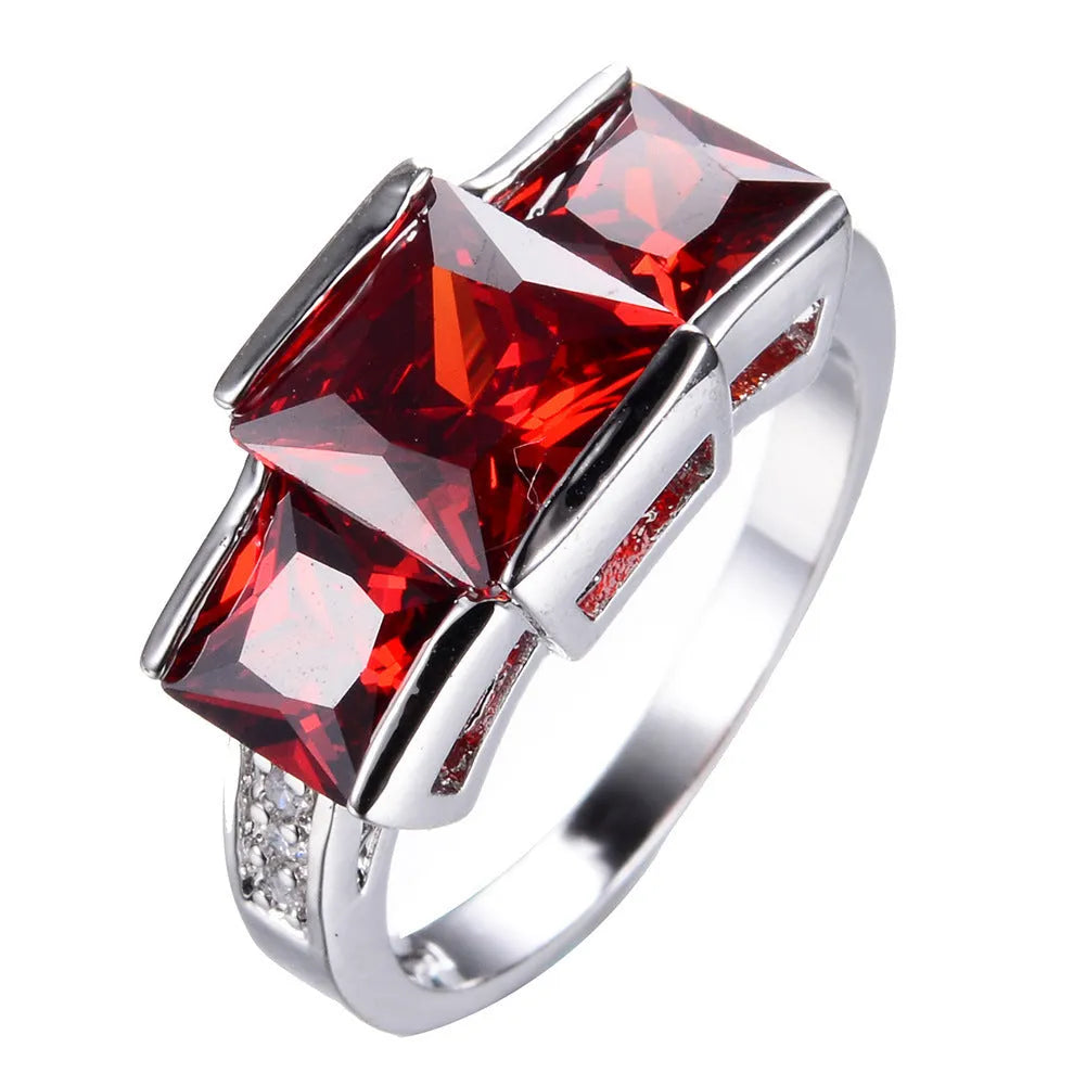 Copper electroplated colourful ring ornament in geometric design showing multiple colour options