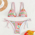Women's lace-up split swimsuit in picture colour with backless design and briefs style