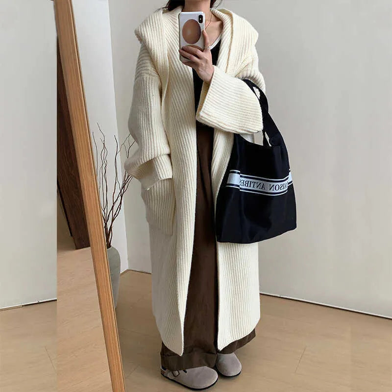 Women's loose hooded cardigan coat in acrylic fibre with extended length and raglan sleeves