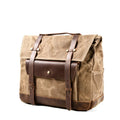 Cotton retro-style messenger bag showing internal organiser pockets and rivet detailing.