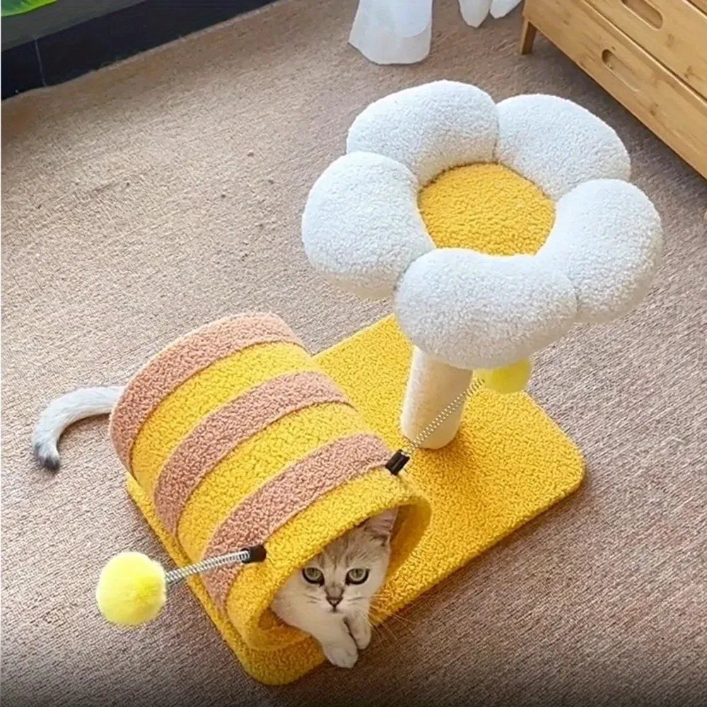 Yellow cat climbing frame with sisal scratching post and integrated tunnel.
