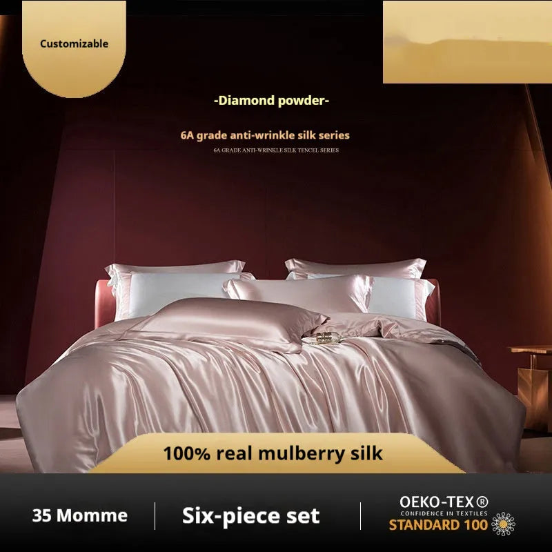 Silk four-piece quilt cover set in solid colour with fitted or flat sheet options for UK bed sizes.
