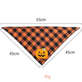 Orange plaid Halloween dog bandana with pumpkin and white skeleton appliques on polyester fabric