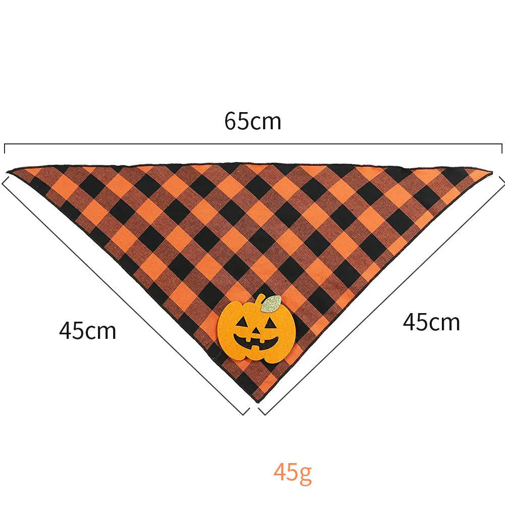 Orange plaid Halloween dog bandana with pumpkin and white skeleton appliques on polyester fabric