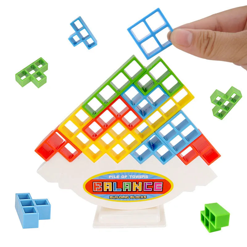 Plastic balance stacking board game with 16 colourful blocks, chassis, and base in a 26.5cm square box.