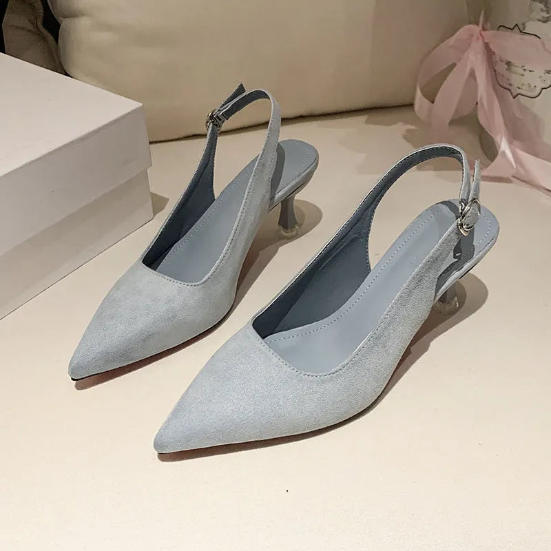 Pointed toe stiletto high heel shoe in suede with a rubber sole.