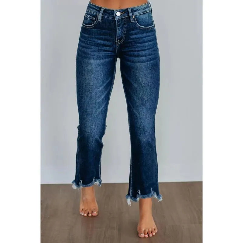 Women's solid colour denim jeans with hand-worn detailing in dark blue and light blue options