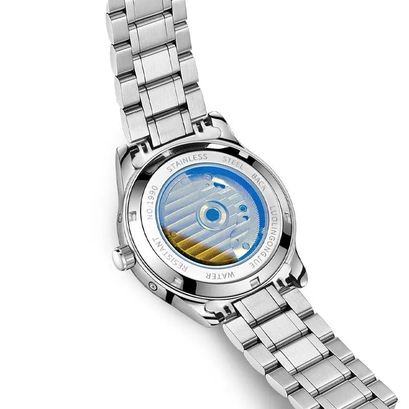 Men's stainless steel business watch with leather strap and sapphire glass, showing transparent case back.