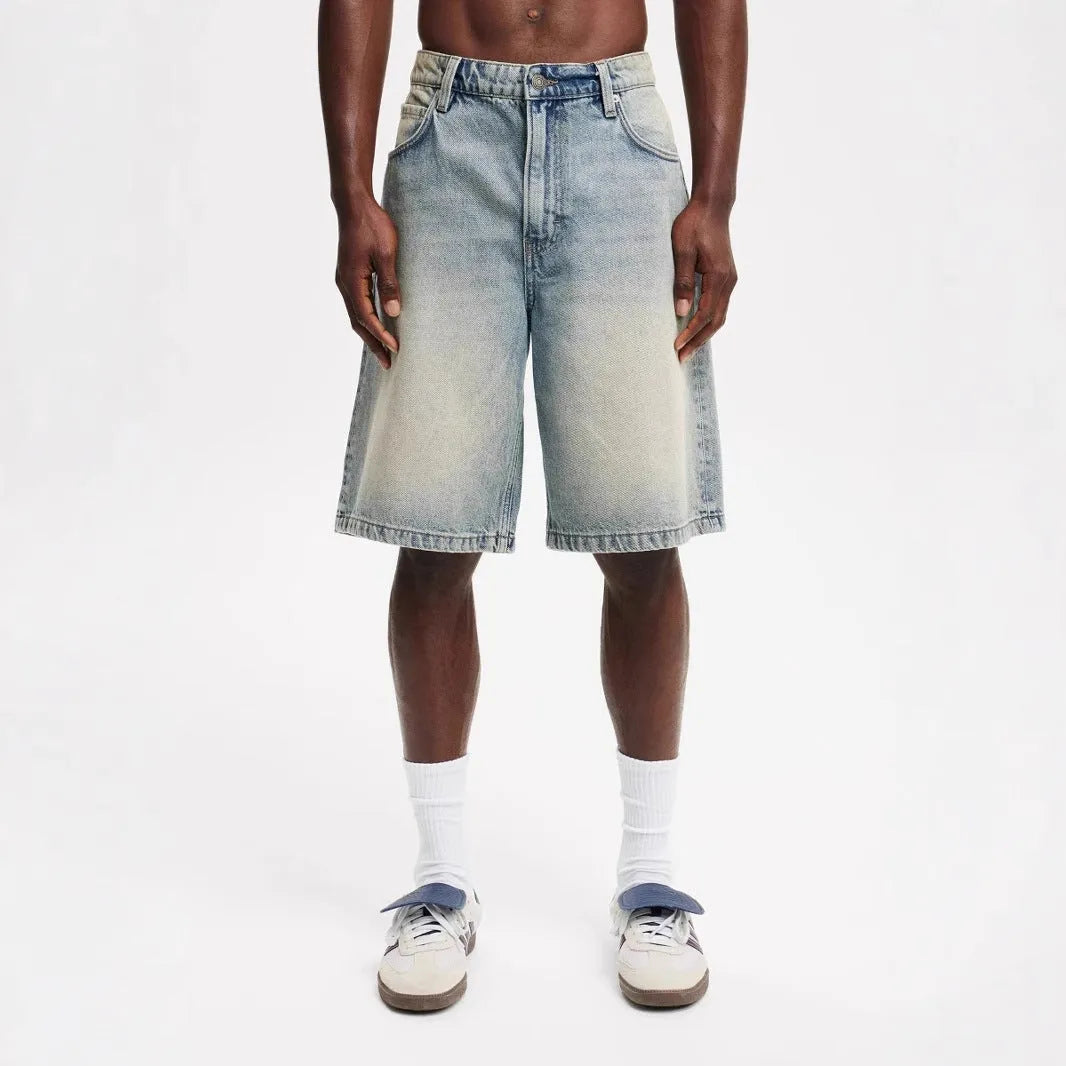 Men's loose fit straight leg jeans in light blue cotton denim