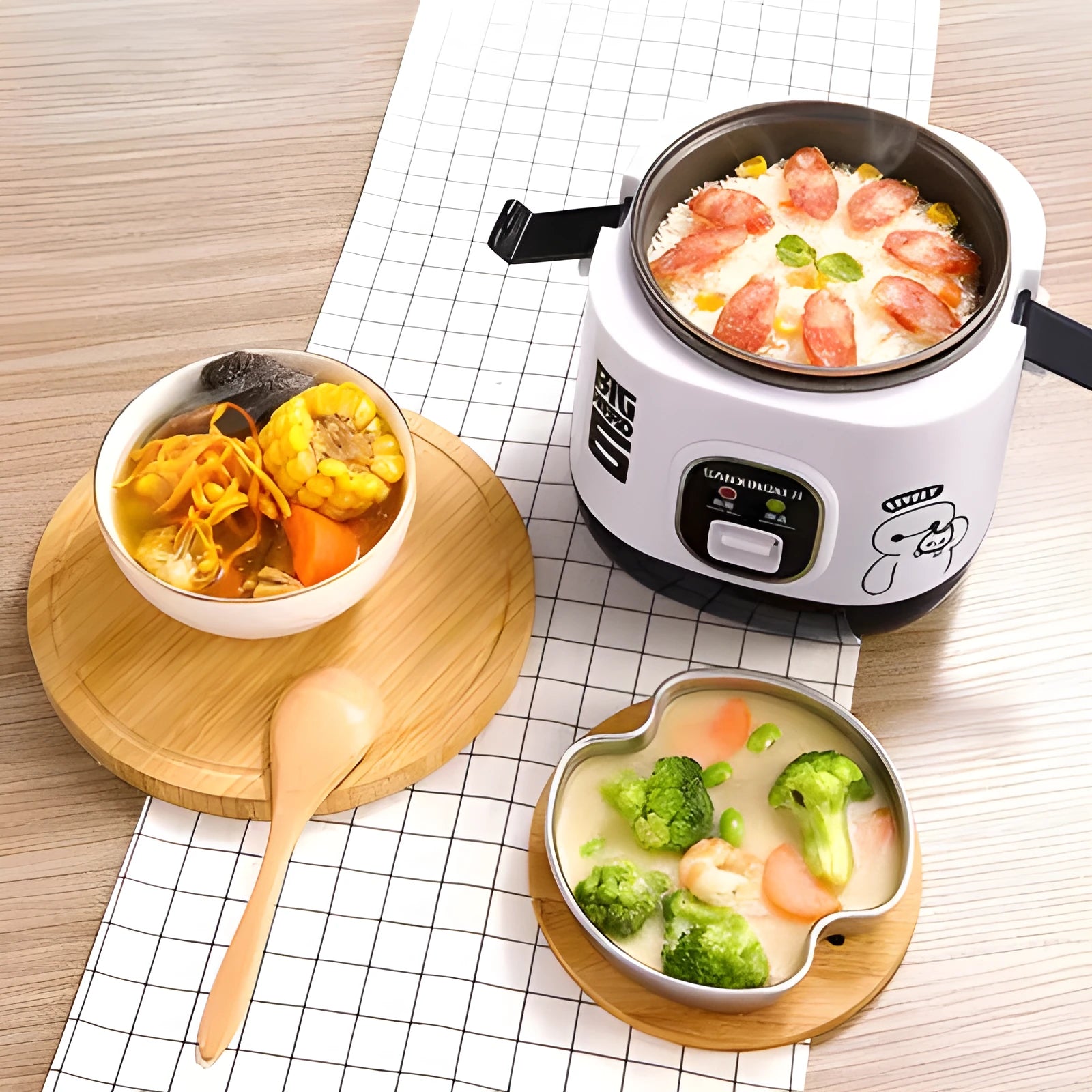 Compact round mini rice cooker with non-stick liner and steam pan for 1-2 person cooking