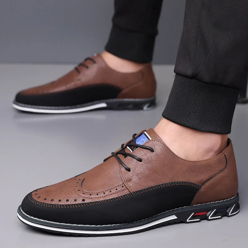 Men's black leather toe cap casual shoes with a fabric upper and rubber sole on a white background.