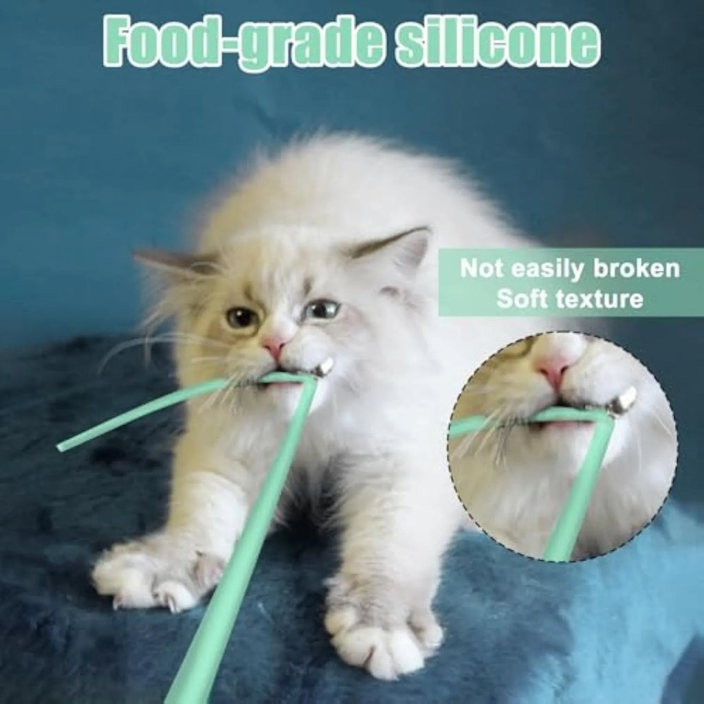Green electronic cat toy with swinging silicone tail on floor for indoor cat play