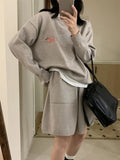 Women's knitted sweater and shorts set with animal embroidery in imitation cashmere fabric