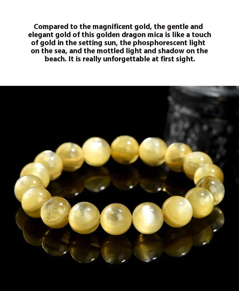 Yellow Lepidolite mica stone bead bracelet with round geometric design on wrist