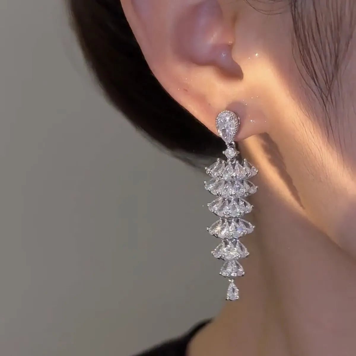 Silver pagoda Christmas tree drop earrings with sparkling zircon stones and stud fastening