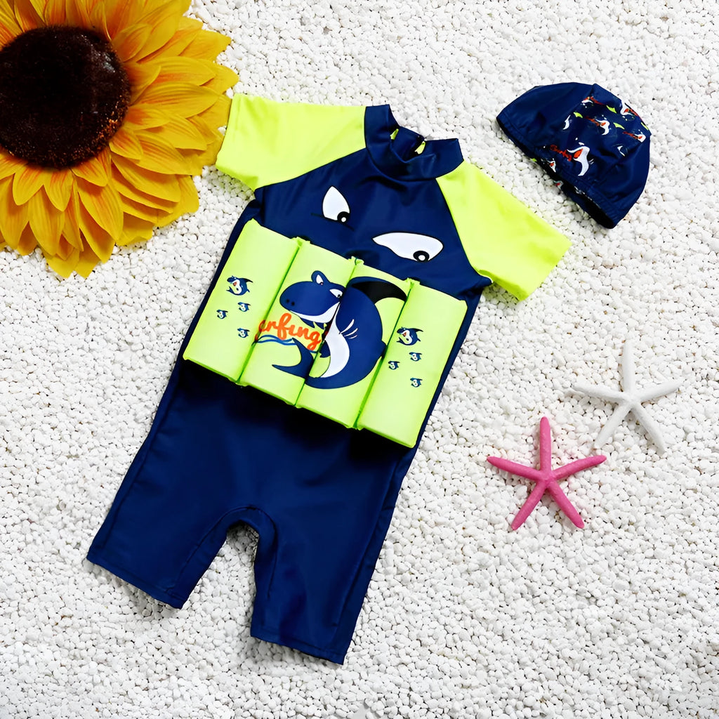 Shark Boy cartoon print one-piece buoyancy swimsuit with sun protection on a mannequin