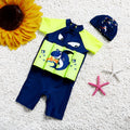Shark Boy cartoon print one-piece buoyancy swimsuit with sun protection on a mannequin