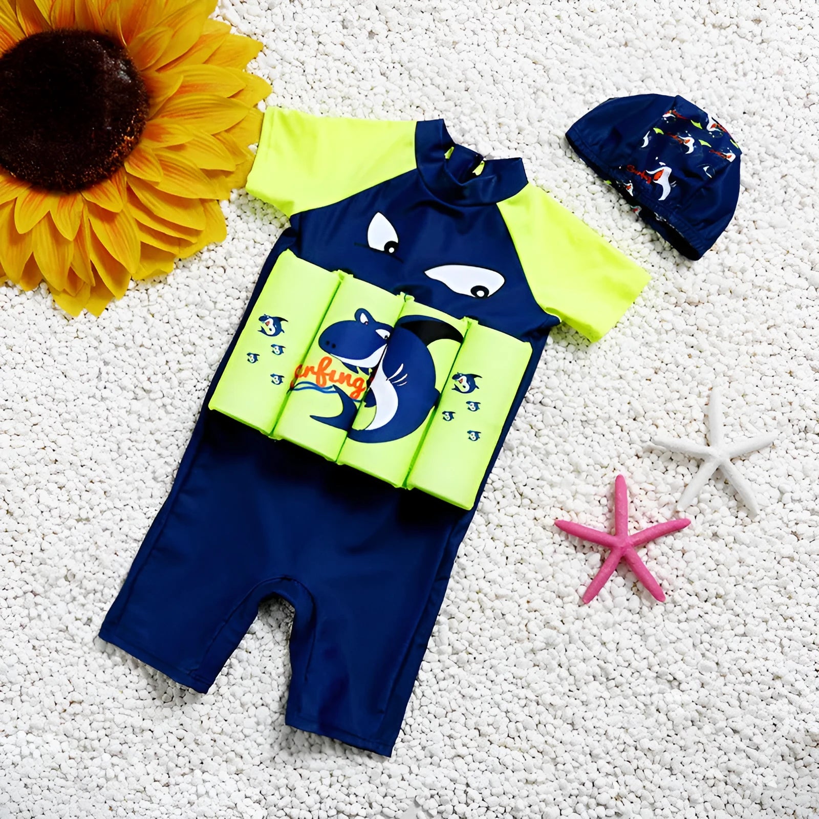 Shark Boy cartoon print one-piece buoyancy swimsuit with sun protection on a mannequin