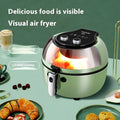 Air fryer oven with viewing window on countertop, showing 8-litre capacity and mechanical button controls.