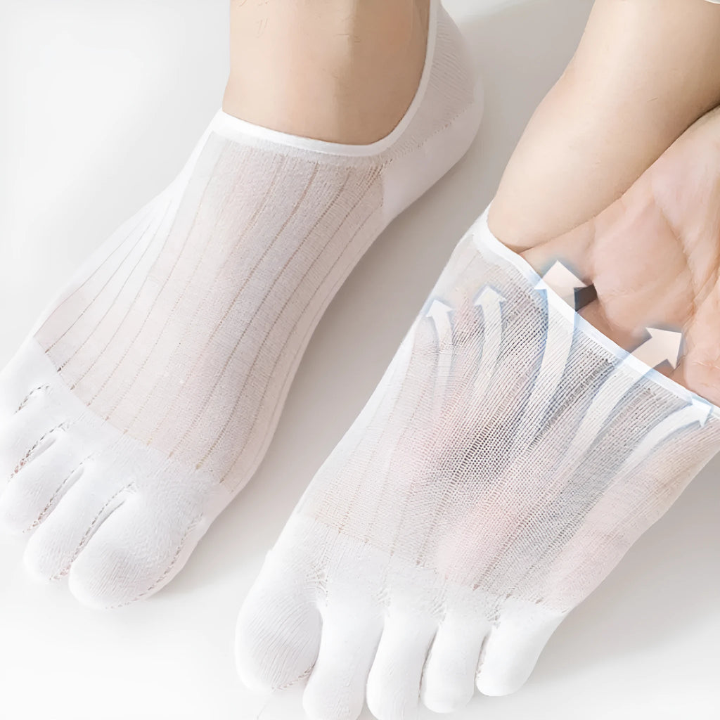 Pair of solid colour modal five-finger boat socks laid flat.