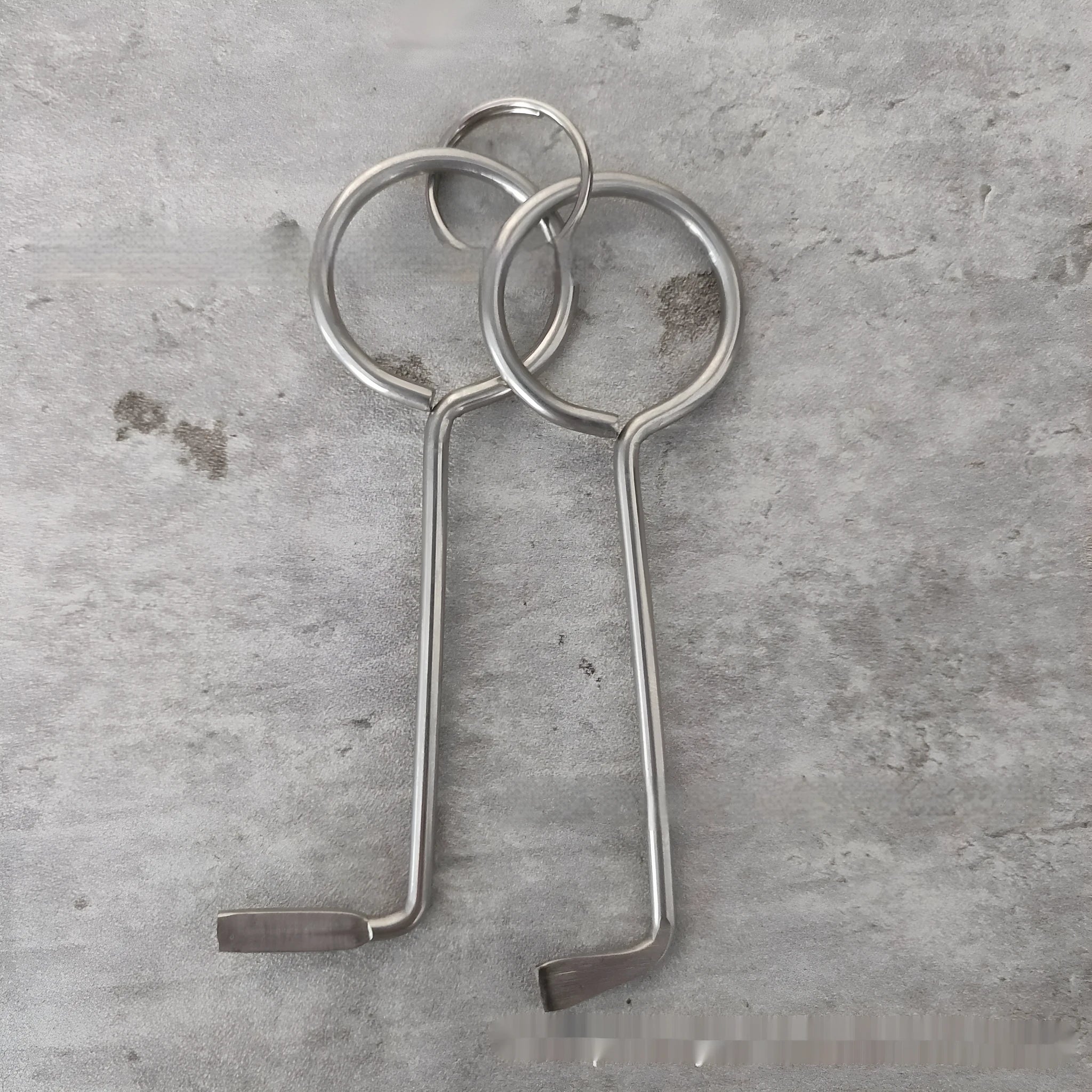 Two-piece alloy metal wrench tool set for portable household DIY use.