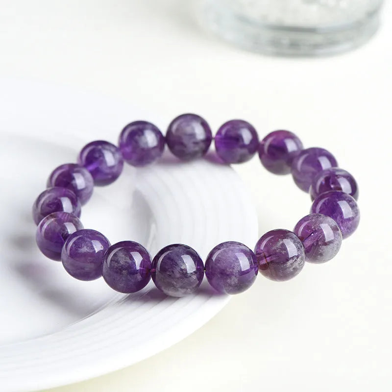 Natural feather amethyst bracelet with purple scattered beads and geometric Ruyi design