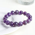 Natural feather amethyst bracelet with purple scattered beads and geometric Ruyi design