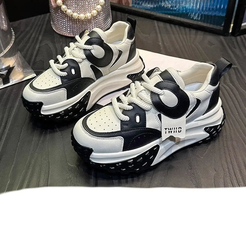Men's thick-soled leather casual shoes with wedge heel in black and white colour.