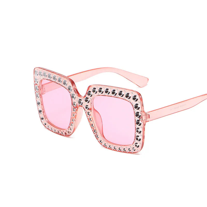Large square frame sunglasses with rhinestone details on a PC frame in multiple colour options