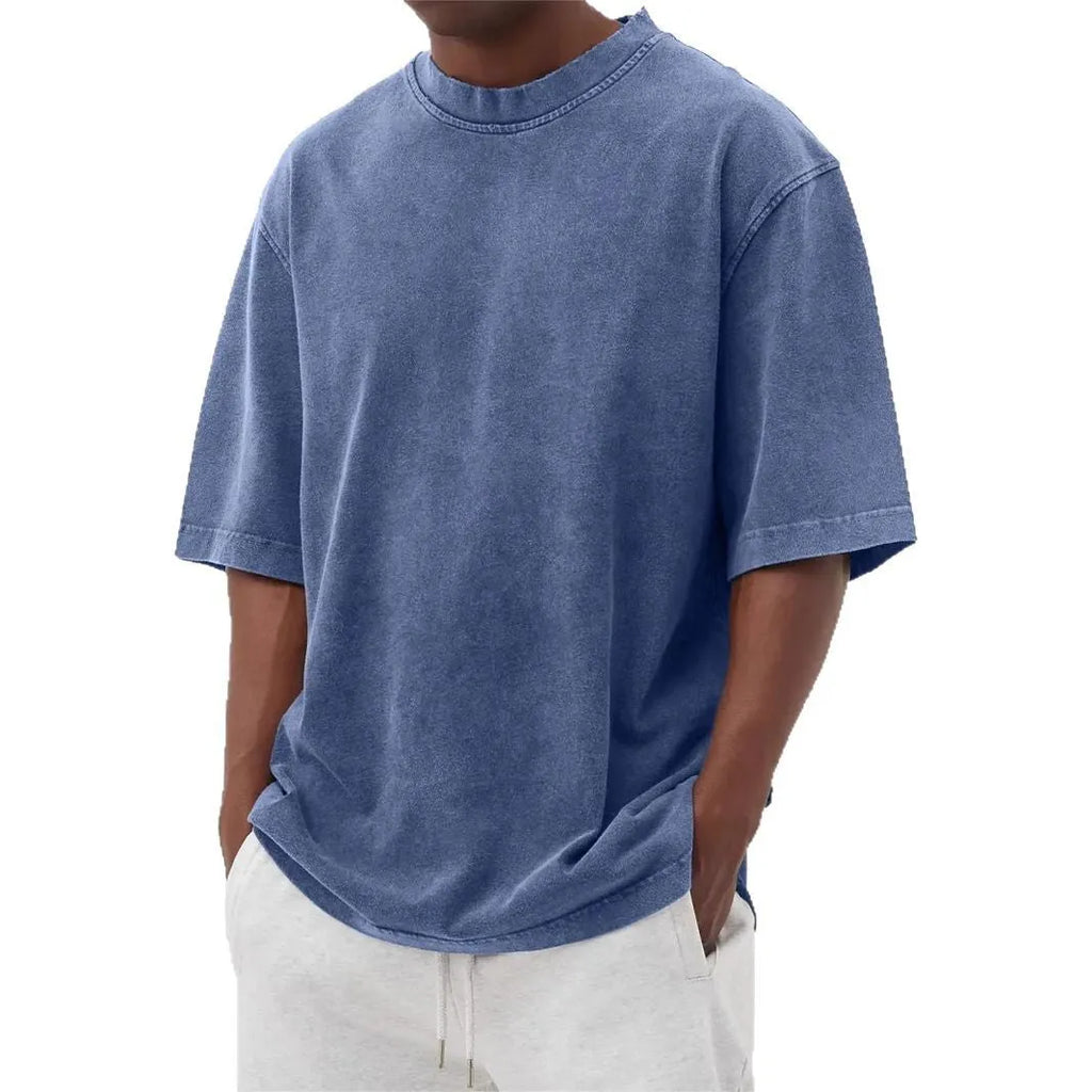 Men's loose fit distressed pullover t-shirt in stone washed polyester showing half sleeve design
