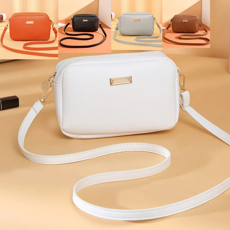 Women's shoulder bag in PU leather with three-dimensional pockets, horizontal square shape