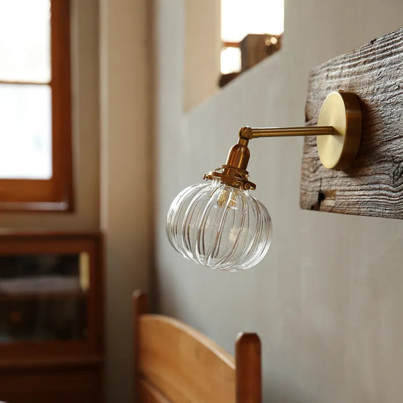 Pumpkin-shaped transparent glass wall lamp for living room or bedroom decor