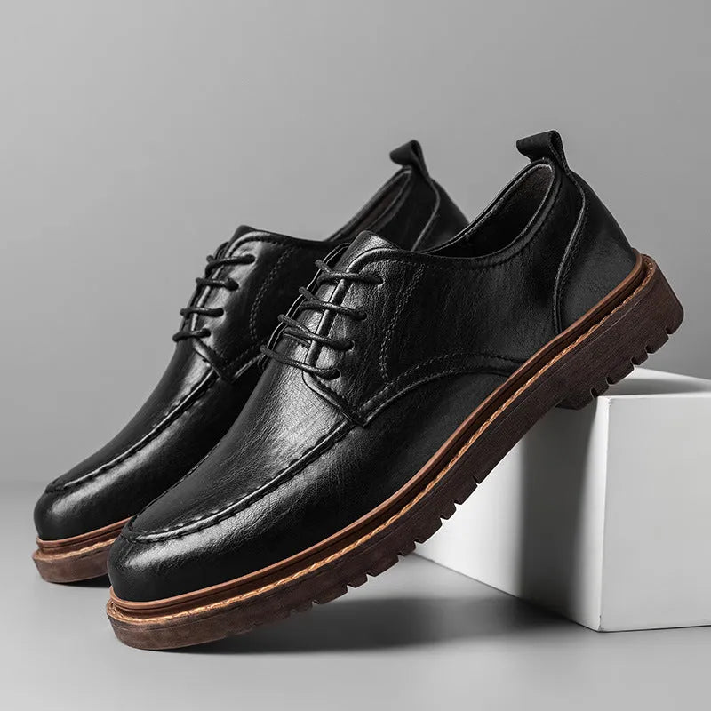 Men's brown casual leather slip-on shoes with round toe and flat rubber sole