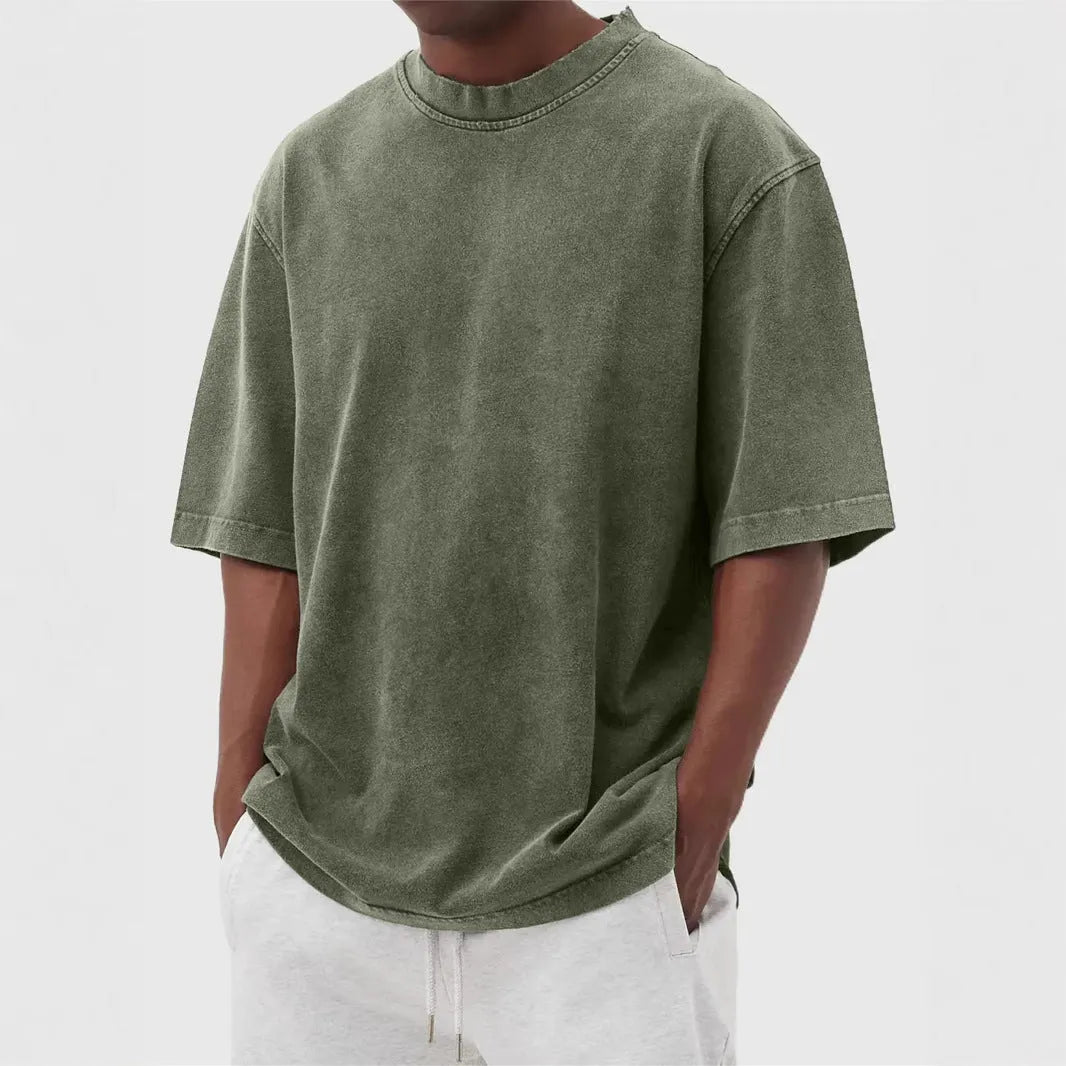 Men's loose fit distressed pullover t-shirt in stone washed polyester showing half sleeve design