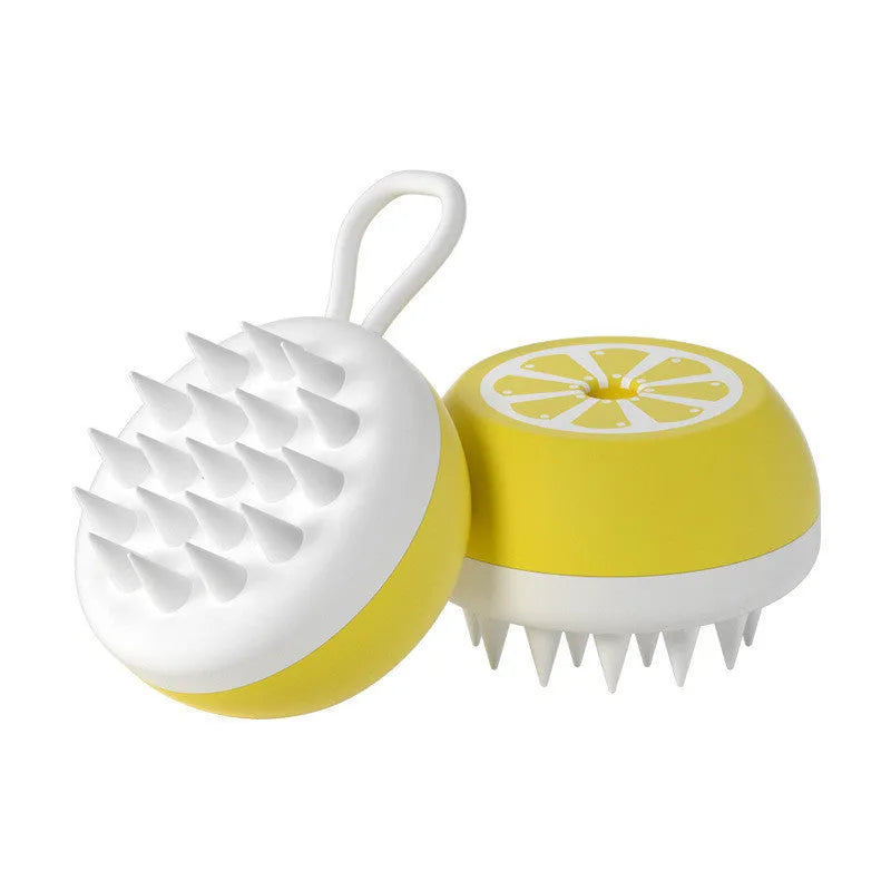 Soft yellow silicone pet bath brush with massage nodes and comb bristles for dog and cat washing.