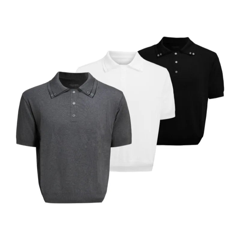 Man wearing a grey loose fit short sleeve shirt with a double collar lapel design.
