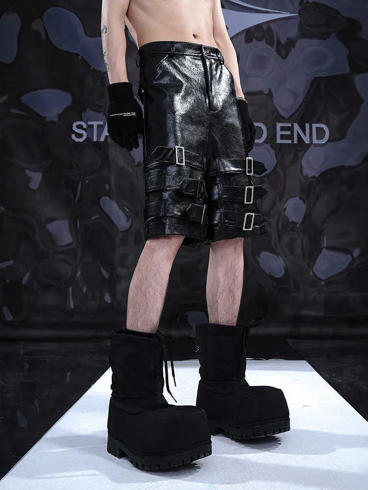 Men's black PU leather ring casual shorts made from stretch spandex fabric.