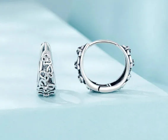 Sterling silver retro butterfly earrings with zircon detailing measuring 14mm tall
