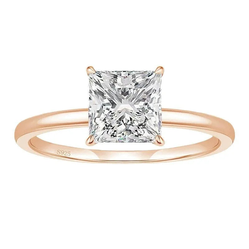 A geometric 925 silver ring with a round zirconium detail, shown in silver, gold, and rose gold finishes.