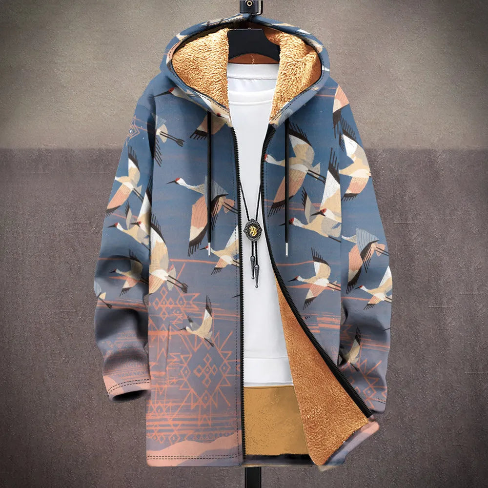 Man wearing a loose fit, multicolour print hooded cardigan with a front zipper.
